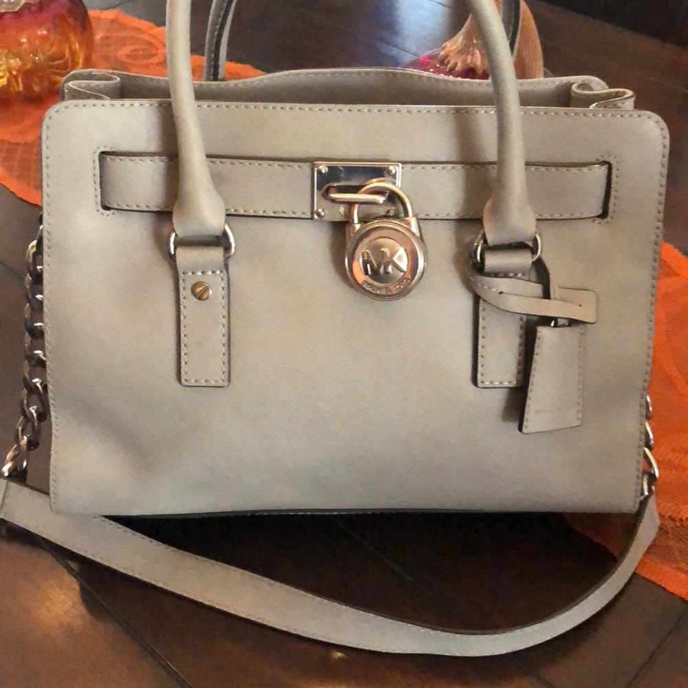 Mk purse gray color three packets inside